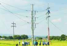 Senator: ‘Threat of tax hike may make NGCP improve services’ Linemen of the National Grid Corporation of the Philippines at the Hermosa-Floridablanca transmission line in Pampanga. NGCP PHOTO
