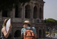 Nearly all major Italian cities on red heat alert AP Photo/Gregorio Borgia