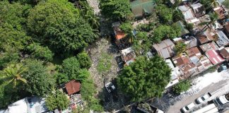 Thirty-two houses of informal settler families will be demolished today, July 18, as part of the ongoing Mambuloc Creek rehabilitation. Photo shows the massive cleaning and garbage hauling of the waterway in May. BCD PIO PHOTO