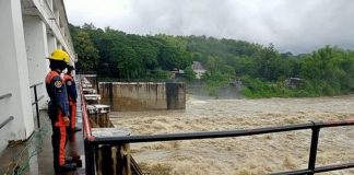 Personnel of the Bureau of Fire Protection monitor the Jalaur River Irrigation System Diversion Dam in Barangay Moroboro, Dingle, Iloilo in this file photo. BFP-DINGLE PHOTO