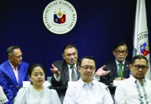 Department of Foreign Affairs (DA) undersecretary for Civilian Security and Consular Affairs Jesus Domingo (center, back row) discusses the e-Visa for foreign nationals during a press conference at the DFA central office along Roxas Boulevard in Pasay City on Wednesday, July 5. He said the Philippines will launch the e-Visa system for foreign travelers within the third quarter of 2023. PNA PHOTO BY AVITO DALAN