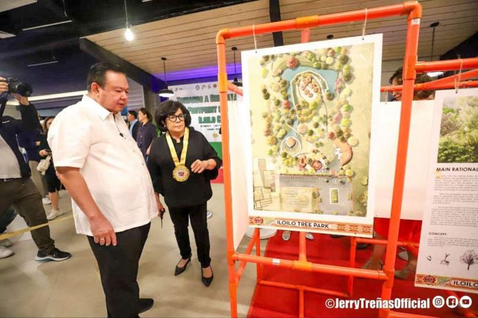 Iloilo City’s Mayor Jerry P. Treñas shows the city government’s Tree Park Network Project to Department of Environment and Natural Resources secretary Ma. Antonia Yulo-Loyzaga (right). JERRY TREÑAS FB PHOTO