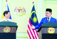 PH-Malaysia partnership on halal to open jobs, biz opportunities President Ferdinand R. Marcos Jr. (left) and Malaysian Prime Minister Anwar Ibrahim hold a joint press conference after their bilateral meeting in Kuala Lumpur on Wednesday, July 26. The two leaders agreed to convene the next Philippines-Malaysia Joint Commission meeting to discuss priority cooperation in areas of mutual interest, including in the halal industry. PHOTO COURTESY OF PRESIDENTIAL COMMUNICATIONS OFFICE