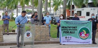 Provincial Health Officer I Dr. Wendel Tupas-Marcelo (second from left, in foreground), announces the provincial government's 2023 Nutrition Month celebration theme and activities at the provincial capitol ground on Monday, July 3. ILOILO PROVINCIAL HEALTH OFFICE FB PHOTO