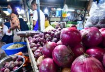 Onions are being sold at the Pasig City Mega Market. MARK DEMAYO, ABS-CBN NEWS/FILE PHOTO