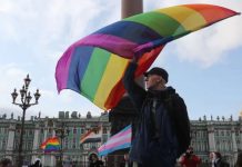 Russia prohibits sex change surgery A participant during the "X St.Petersburg Pride" LGBT community rally in central Saint Petersburg, Russia August 3, 2019. REUTERS/Anton Vaganov