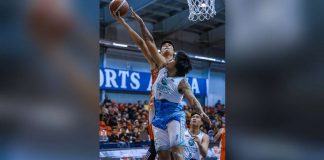NorthPort Batang Pier’s Arvin Tolentino goes for a layup against the defense of Phoenix Super LPG Fuel Masters' Larry Muyang. PBA PHOTO