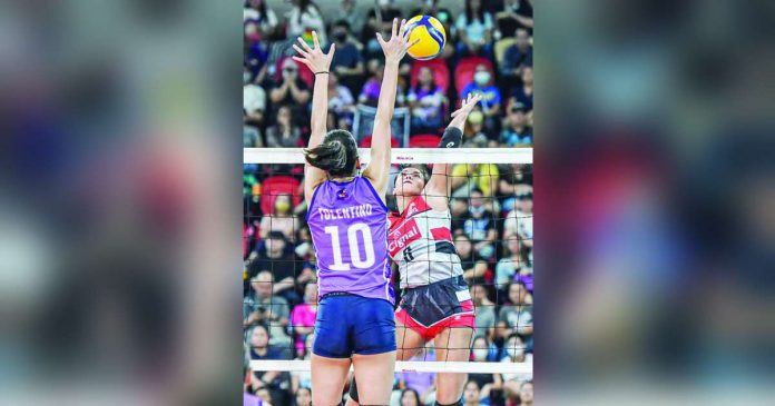 sports cignal_superimposed Guimarasnon Jovelyn Gonzaga goes for a tough attempt against Choco Mucho Flying Titans’ Kat Tolentino. PVL PHOTO