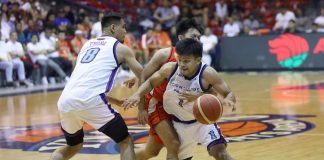 Converge FiberXers’ playing assistant coach McJour Luib uses the screen of teammate Barkley Ebona to get away from his NorthPort Batang Pier defender. PBA PHOTO