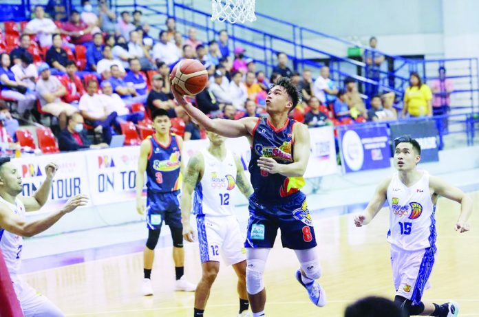 sports_PBA_resized Rain or Shine Elasto Painters’ Anton Asistio scoops for a layup during their 2023 PBA on Tour game against TNT Tropang Giga. PBA PHOTO