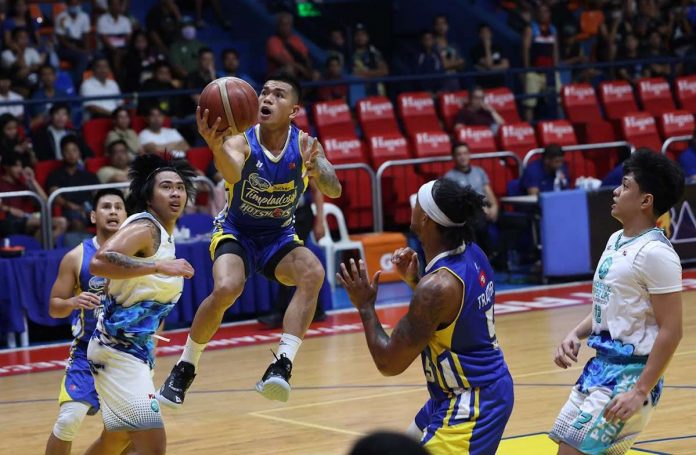 sports_PBA_resized Magnolia Chicken Timplados Hotshots’ Jiovani Jalalon sits on the air as he goes for a layup.