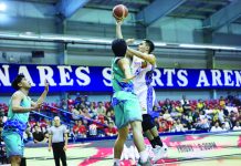 Bacolodnon Kib Montalbo of TNT Tropang Giga attempts a one-hander against the defense of Phoenix Super LPG Fuel Masters’ Rodolfo Alejandro Jr. PBA PHOTO