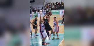 Bacolod City of Smiles’ Domark Matillano goes for a tough basket against the defense of Quezon City TODA Aksyon V Fresh’s Kim Kaizen Lo. MPBL PHOTO