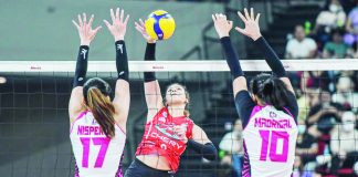 Chery Tiggo Crossovers’ Ejiya Laure goes for a drop shot against two Akari Power Chargers defenders. PVL PHOTO