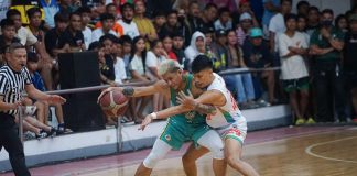 Negros Pau Muscovados’ Leo James Ingles dribbles the ball while being tightly guarded by Bacolod City of Smiles’ Christopher Menguez. MPBL PHOTO