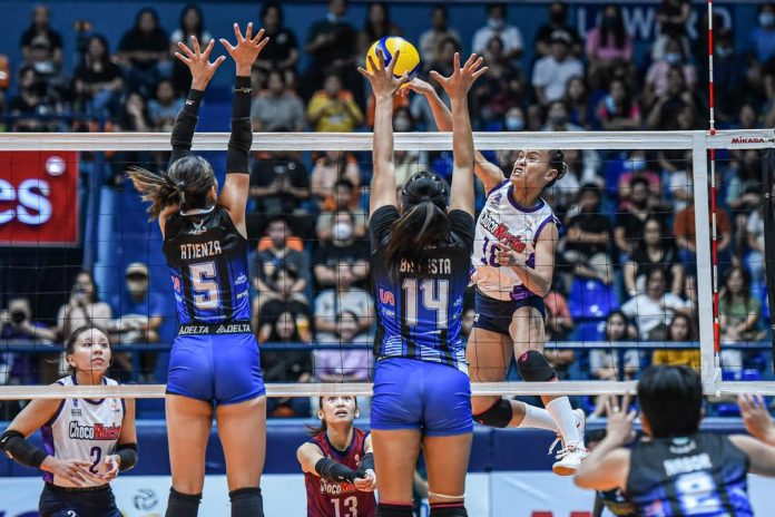 Choco Mucho Flying Titans’ Cherry Rondina goes for an attack against the defense of Foton Tornadoes’ Jaila Atienza and Ilongga Nerissa Bautista. PVL PHOTO