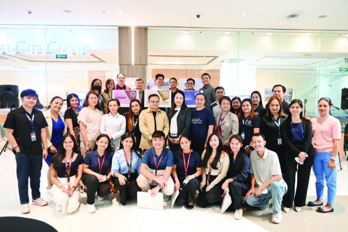 Assure_2.JPG_resized TMC Iloilo corporate partners, local media and bloggers, employees graced the launching of the ASSURE Emergency Prepaid Health Card.