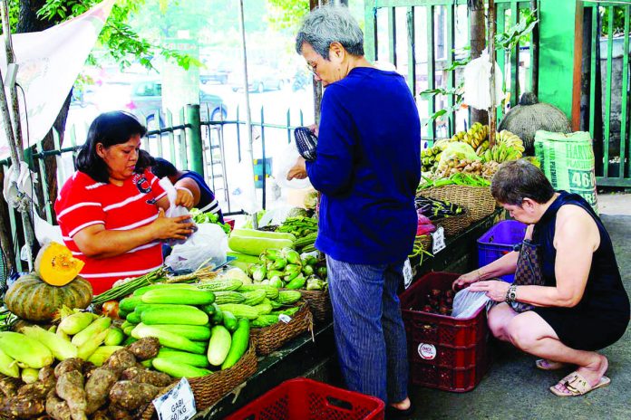 GDP_resized FRESH VEGGIES AT KADIWA. Consumers buy fresh vegetables at the Agripreneur Cooperative Kadiwa stall inside the Department of Agriculture-Agribusiness Development Center along Elliptical Road, Quezon City. To achieve the target economic growth rate of six percent to seven percent for the year, the country’s gross domestic product needs to grow by at least 6.6 percent in the second half of 2023, according to the National Economic and Development Authority. PNA