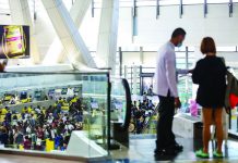 Travelers line up at airline counters to process their travel documents at the Ninoy Aquino International Airport Terminal 3 in Pasay City. JONATHAN CELLONA/ABS-CBN NEWS PHOTO