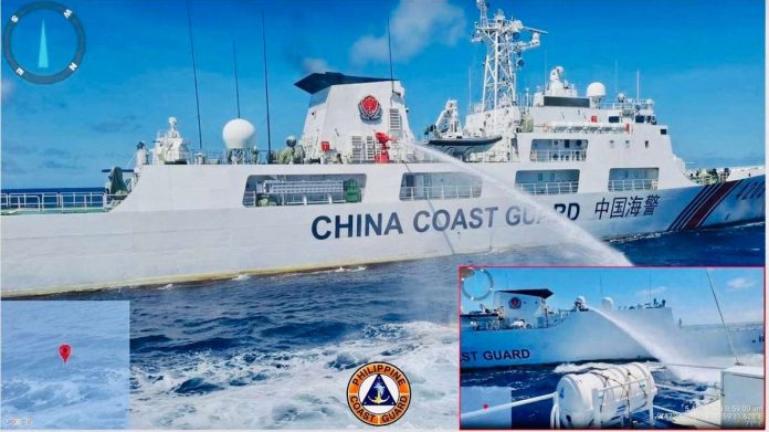 PCG_resized A Chinese Coast Guard ship sprays with water the Philippine Coast Guard’s vessels delivering food, water, fuel, and other supplies to military troops stationed on BRP Sierra Madre in Ayungin Shoal, West Philippine Sea. Photo courtesy of PCG