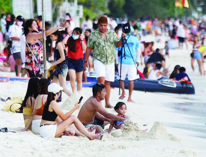 Pinoys_traveling.JPG_resized The easing up of travel made Filipinos travel further from Metro Manila, according to Hotel Sales and Marketing Association of the Philippines. PHOTO COURTESY OF ABS-CBN News