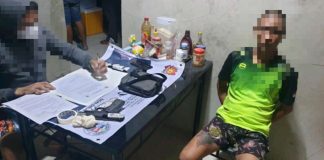 Drug suspect Roel Cerbolles was arrested through a search warrant in Barangay Canabajan, Calinog, Iloilo on Monday, Aug. 7. He yielded P315,000 worth of suspected shabu, caliber .45 pistol and fragmentation grenade. IPPO PHOTO