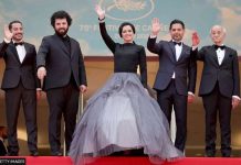 Director jailed in Iran for Cannes screening Saeed Roustaee (second left) with the cast of “Leila’s Brothers” on the red carpet in Cannes in May 2022. GETTY IMAGES