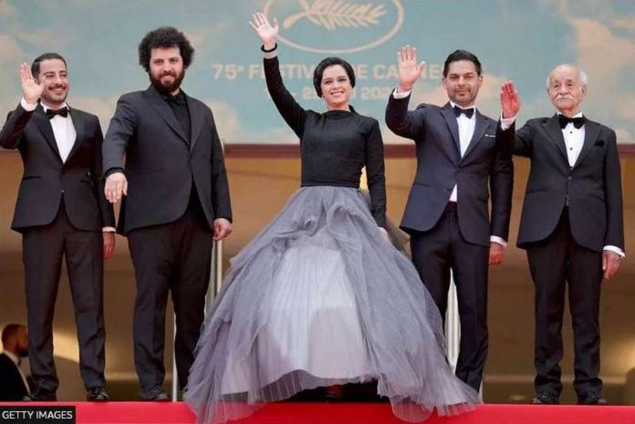 iran_resized Saeed Roustaee (second left) with the cast of “Leila’s Brothers” on the red carpet in Cannes in May 2022. GETTY IMAGES