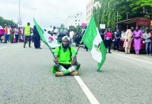 Nigeria to hand out food as cost of living bites Nigerians have been protesting against inflation. GETTY IMAGES