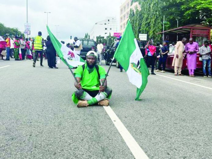 nigeria_resized Nigerians have been protesting against inflation. GETTY IMAGES