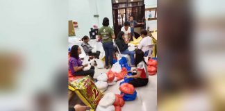 Provincial Social Welfare and Development Office personnel prepare family food packs for displaced families in Antique. PROVINCE OF ANTIQUE PHOTO