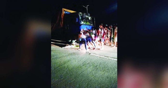run over (1)_superimposed A truck ran over a seven-year-old boy and his grandfather in Hamtic, Antique on Wednesday night, Aug. 23. The boy died while the grandfather sustained injuries. 104.5 BRIGADA SAN JOSE-ANTIQUE FB