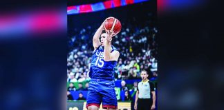 Austin Reaves of Team USA grabs the rebound during their 2023 FIBA Basketball World Cup game against Greece. FIBA PHOTO