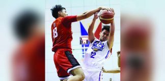 Barangay Ginebra San Miguel Kings’ Ralph Cu blocks the shot attempt of NLEX Road Warriors’ Celedonio Trollano. PBA PHOTO