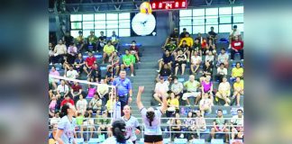 Katherine Shaine Cortez of Western Visayas secondary girls volleyball team tosses the ball high as her teammates look on. PHOTO COURTESY OF DEPED TAYO WESTERN VISAYAS REGION