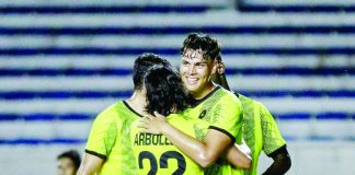 Kaya-Iloilo FC newcomer Justin Baas (16) is hugged by teammate Fitch Arboleda after knocking in a goal early in the second half against Loyola FC. KAYA-ILOILO PHOTO