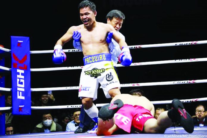 sports_manny_resized Retired Filipino boxer Manny Pacquiao knocks down South Korean Youtuber DK Yoo during their exhibition match last December 2022. PHOTO COURTESY OF WENDELL ALINEA/MP PROMOTIONS