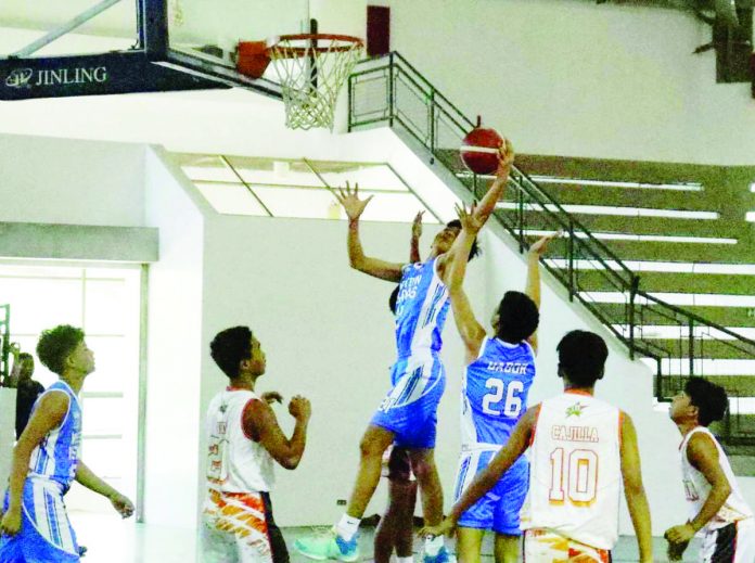 sports_tay_resized Western Visayas elementary boys basketball team’s Ashton Jarred Buñol grabs the rebound during their 2023 Palarong Pambansa gold medal game against Northern Mindanao. PHOTO COURTESY OF DEPED TAYO WESTERN VISAYAS REGION