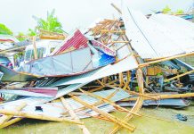 Tornado rips Jaro biz shops Two workers were hurt, and nine cars were damaged when a tornado ripped through Barangay Tagbak, Jaro, Iloilo City yesterday morning, Aug. 30. AJ PALCULLO/PN