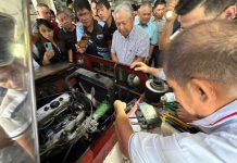 Transport secretary Jaime Bautista witnesses the demonstration of 3 Filipino inventions meant to save fuel and reduce carbon emissions at the Land Transportation Office, Diliman, Quezon City on Aug. 25. ANDREA TAGUINES/ABS-CBN NEWS PHOTO