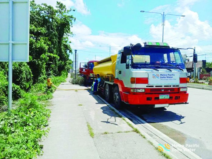 water_tanker_pic_resized MANAGING WATER SUPPLY. Metro Pacific Iloilo Water says water supply from its bulk supplier is being distributed equitably to customers. It is also increasing its number of water tankers delivering water round the clock. METRO PACIFIC ILOILO WATER PHOTO