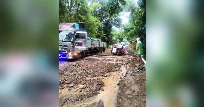 Antique_superimposed The recurring mudflow hampers motorists passing the Barangay Igbarawan road in Patnongon, Antique. As of yesterday morning, Sept. 17, the road became passable. CHARRY VERTE SONGCAYAWON
