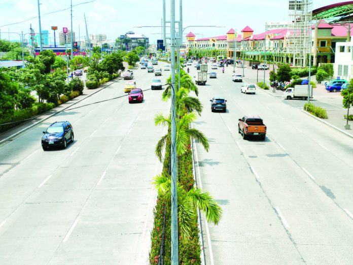 PUVs_pic_resized The Land Transportation Office orders a nationwide crackdown against “colorum” public utility vehicles. Photo shows the eight-lane Benigno Aquino Jr. Avenue, also known as Diversion Road, in Mandurriao, Iloilo City on Monday morning, Sept. 11. AJ PALCULLO/PN
