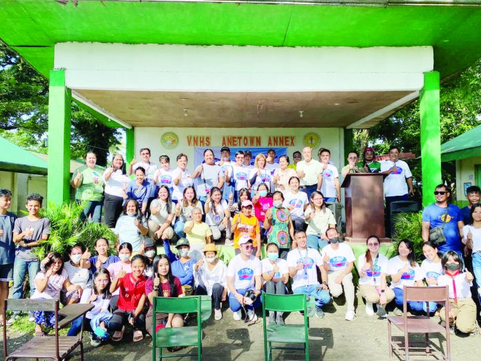 Victorias Milling Company president Linley Retirado leads volunteers in their Brigada Eskwela initiative at the Victorias Elementary School.