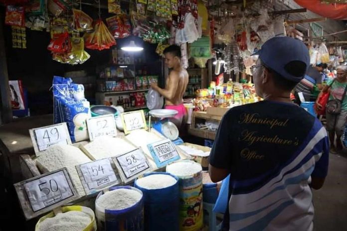 aklan_rice_resized Personnel of the Municipal Agriculture Office and Business Permits and Licensing Office of Numancia, Aklan inspect rice prices at the Numancia Public Market on Sept. 6. NUMANCIA LGU PHOTO