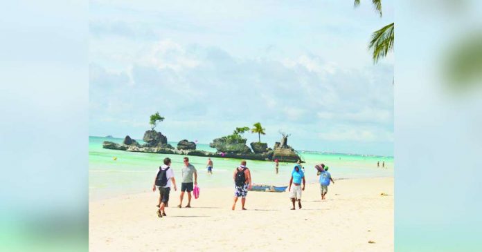 boracay_superimposed The island destination Boracay in Aklan welcomed a 29 percent increase in arrivals as of August this year, or 1.5 million tourists. BOY RYAN ZABAL/AKEAN FORUM