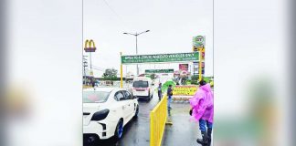 An ambulance exceeded the set vertical height limit and hit the gantry at the approach of the Ungka flyover on Friday, Sept. 22. The flyover reopened to four-wheeled light vehicles yesterday. AJ PALCULLO/PN