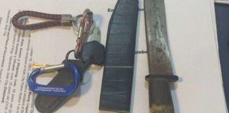 Operatives of the Iloilo City Police Office confiscate a bladed weapon on Aug. 30, 2023 in line with the implementation of the Commission on Elections gun ban. ICPO PHOTO