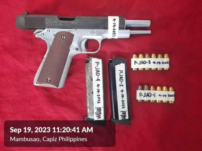 gun_to_court_resized An unlicensed firearm with ammunition was recovered from a man about to enter a court in Mambusao, Capiz on Tuesday, Sept. 19. MAMBUSAO MUNICIPAL POLICE STATION PHOTO