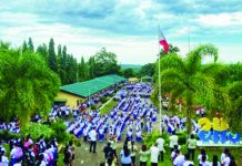The Janiuay National Comprehensive High School suspended classes after an alleged mass hysteria. Photo shows students of the school during a flag ceremony in 2022. DEPED TAYO ILOILO FB